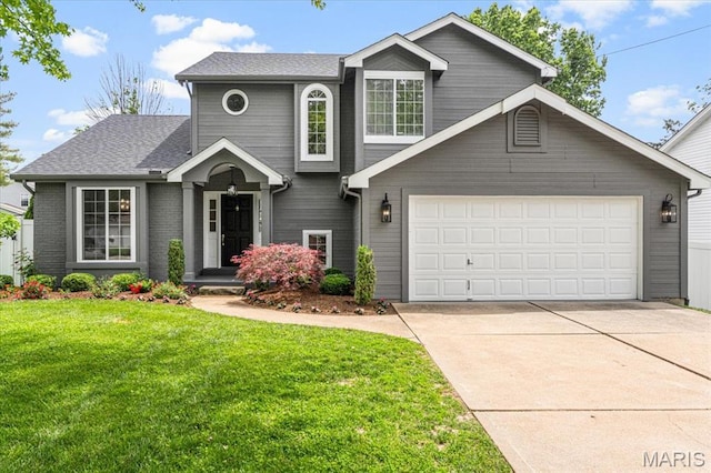 938 Blase Ave, Saint Louis, MO 63131 - traditional home with driveway, a front yard, an attached garage, and roof with shingles
