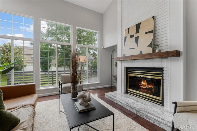 938 Blase Ave, Saint Louis, MO 63131 - living area with a fireplace and wood finished floors