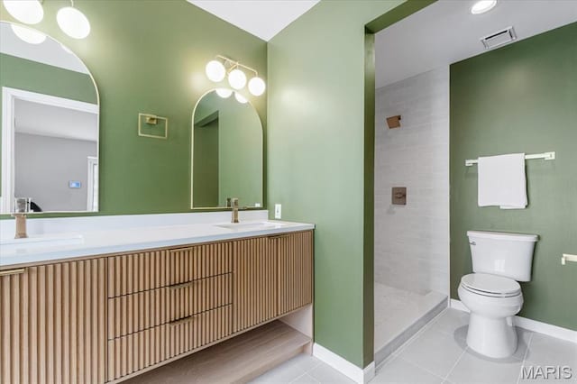 938 Blase Ave, Saint Louis, MO 63131 - full bathroom featuring double vanity, tile patterned floors, and tiled shower