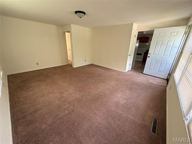 418 Monroe St, Pacific, MO 63069 - unfurnished bedroom featuring carpet floors and baseboards