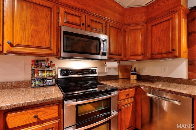 1369 County Highway 408, Benton, MO 63736 - kitchen featuring appliances with stainless steel finishes and brown cabinets