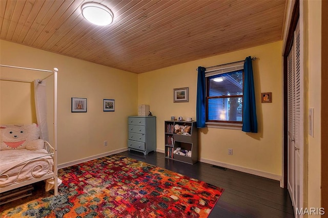 1369 County Highway 408, Benton, MO 63736 - bedroom with dark wood-style flooring and wood ceiling