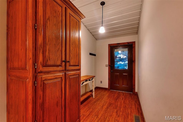 1369 County Highway 408, Benton, MO 63736 - doorway to outside featuring dark wood-type flooring and baseboards
