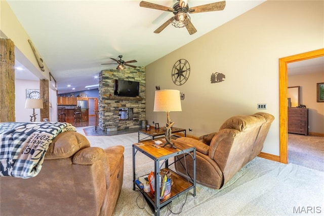 317 Johnson Pl, Palmyra, MO 63461 - living room with lofted ceiling, a ceiling fan, carpet flooring, and a stone fireplace