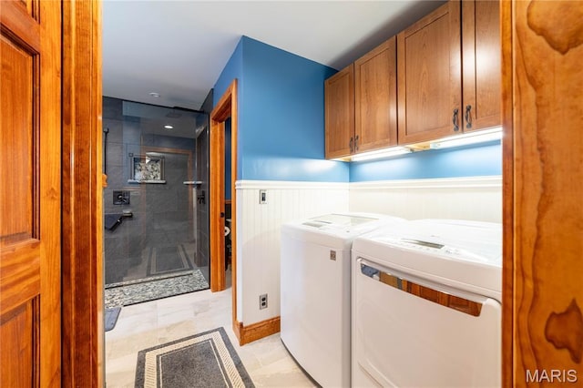 317 Johnson Pl, Palmyra, MO 63461 - laundry area with cabinet space, washing machine and clothes dryer, a wainscoted wall, and recessed lighting