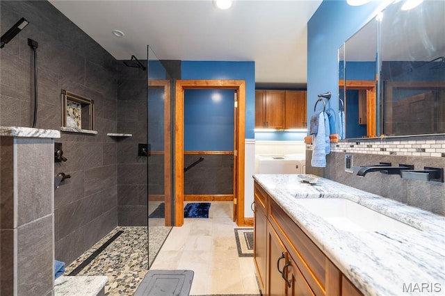 317 Johnson Pl, Palmyra, MO 63461 - full bathroom featuring separate washer and dryer, walk in shower, and vanity