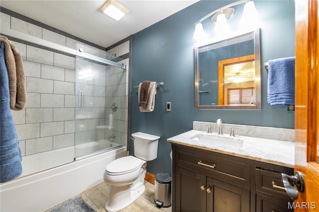 317 Johnson Pl, Palmyra, MO 63461 - full bath featuring vanity, enclosed tub / shower combo, and wood finished floors