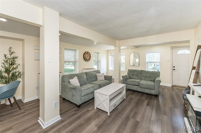 6451 Odell St, Saint Louis, MO 63139 - living area featuring dark wood finished floors and recessed lighting