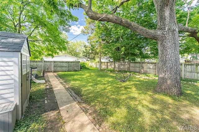 6451 Odell St, Saint Louis, MO 63139 - fenced backyard featuring a storage shed