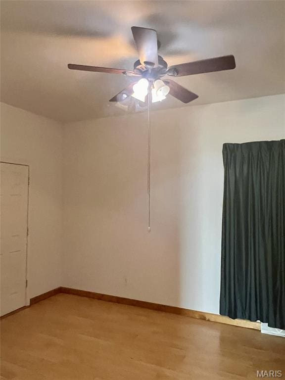 315 E N St, Saint Clair, MO 63077 - empty room featuring light wood-style floors and ceiling fan