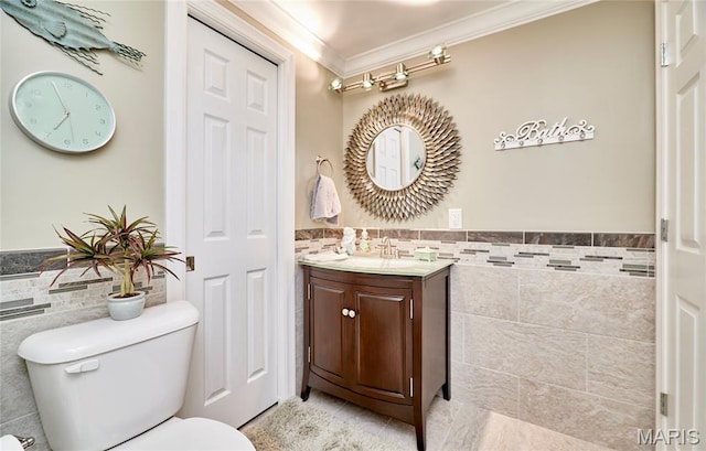 2421 Golden Bear Way Unit 731A, Wentzville, MO 63385 - bathroom with tile walls, crown molding, vanity, tile patterned flooring, and wainscoting