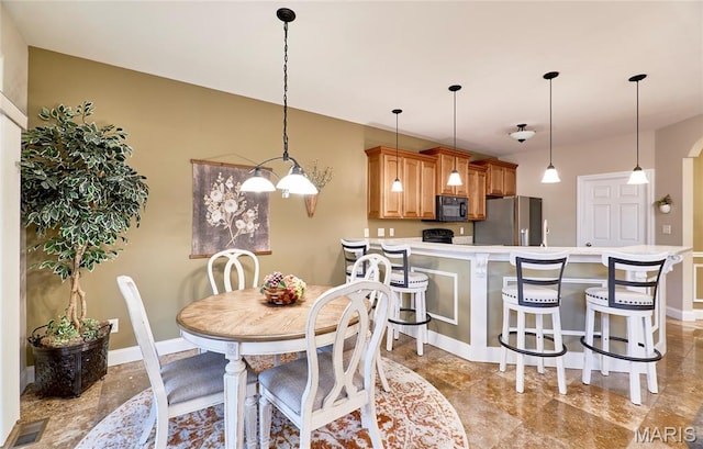 2421 Golden Bear Way Unit 731A, Wentzville, MO 63385 - dining space with baseboards