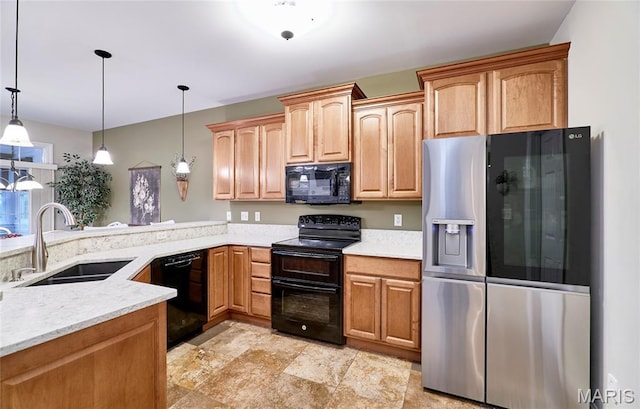 2421 Golden Bear Way Unit 731A, Wentzville, MO 63385 - kitchen featuring black appliances, decorative light fixtures, light stone countertops, a peninsula, and light stone finish flooring