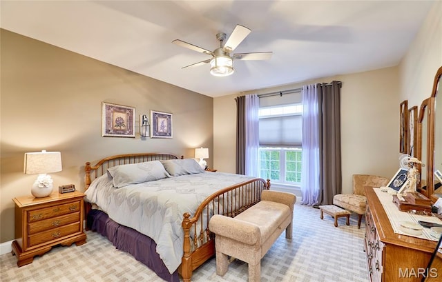 2421 Golden Bear Way Unit 731A, Wentzville, MO 63385 - bedroom featuring light carpet and a ceiling fan
