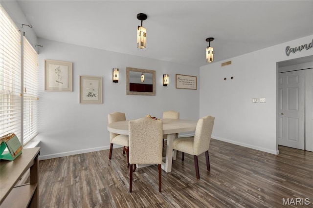 1943 Greenpoint Dr Unit 302, Kirkwood, MO 63122 - dining space with dark wood-style flooring and baseboards