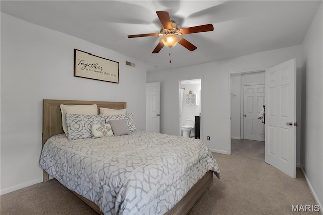 1943 Greenpoint Dr Unit 302, Kirkwood, MO 63122 - bedroom with light colored carpet, ceiling fan, and connected bathroom
