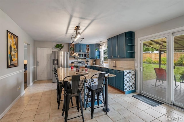 308 Rebecca Dr, Saint Charles, MO 63301 - dining area with light tile patterned floors and healthy amount of natural light