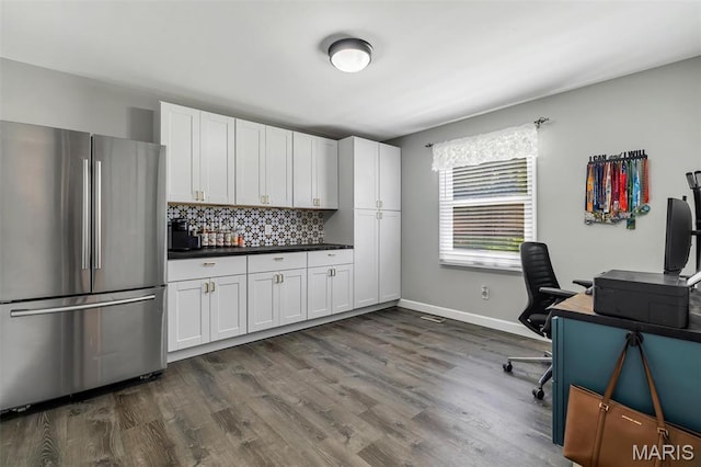 308 Rebecca Dr, Saint Charles, MO 63301 - home office with dark wood-style floors and baseboards