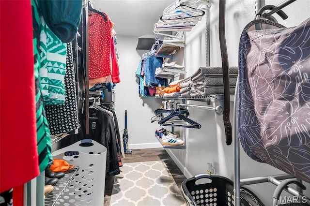 308 Rebecca Dr, Saint Charles, MO 63301 - walk in closet featuring wood finished floors