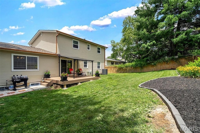308 Rebecca Dr, Saint Charles, MO 63301 - back of house featuring a fenced backyard and a deck