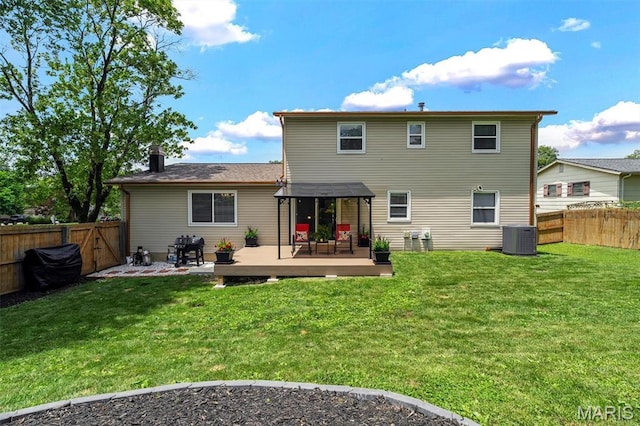 308 Rebecca Dr, Saint Charles, MO 63301 - rear view of house with a deck and a fenced backyard