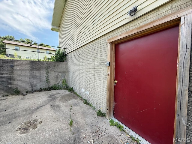 1206 Virginia Ave, Canton, MO 63435 - entrance to property with brick siding and a patio area