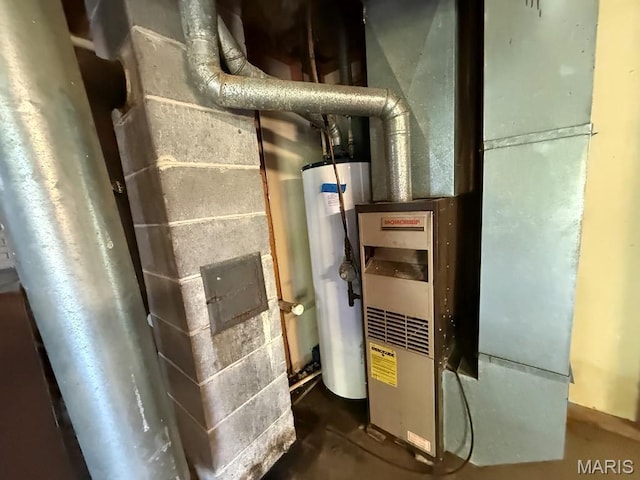 1206 Virginia Ave, Canton, MO 63435 - utility room featuring gas water heater and heating unit