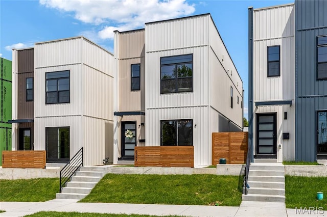 6297 Magnolia Ave, Saint Louis, MO 63139 - view of front facade with board and batten siding