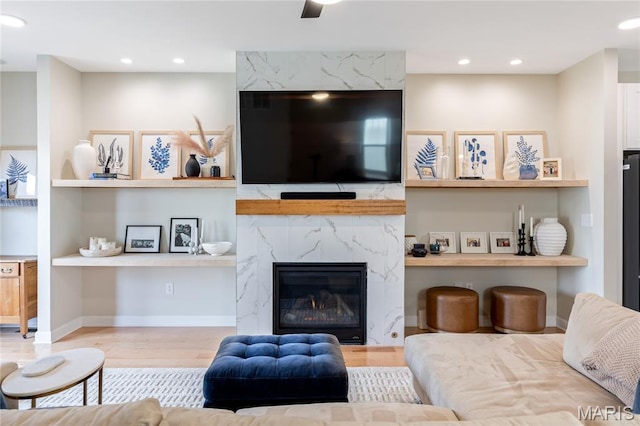6297 Magnolia Ave, Saint Louis, MO 63139 - living room with wood finished floors, recessed lighting, and built in features
