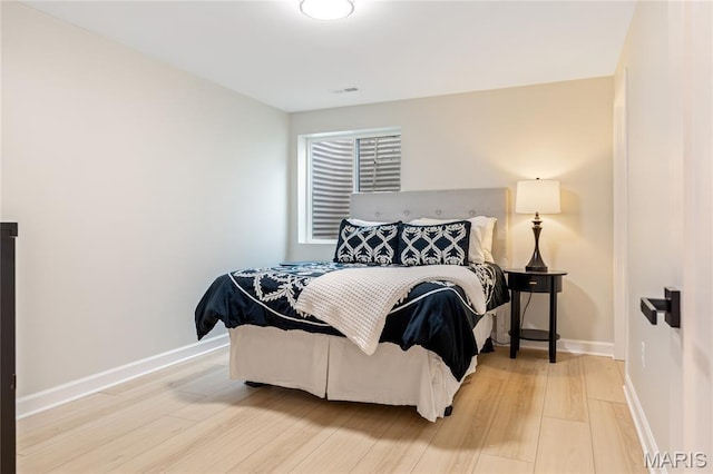 6297 Magnolia Ave, Saint Louis, MO 63139 - bedroom featuring wood finished floors and baseboards