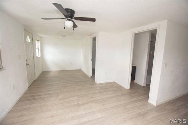 15 S 13th St, Wood River, IL 62095 - unfurnished room featuring light wood-style flooring and ceiling fan