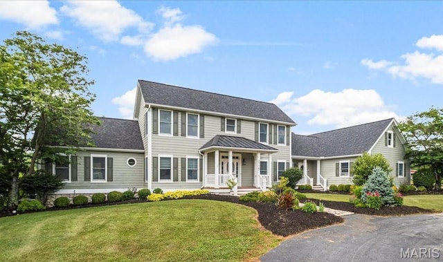 2175 Oberhelman Rd, Foristell, MO 63348 - colonial house with a front yard and covered porch