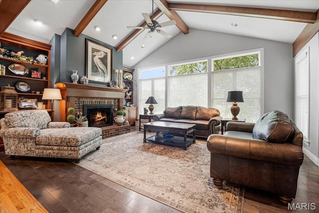 2175 Oberhelman Rd, Foristell, MO 63348 - living room featuring beamed ceiling, wood finished floors, a brick fireplace, a ceiling fan, and recessed lighting