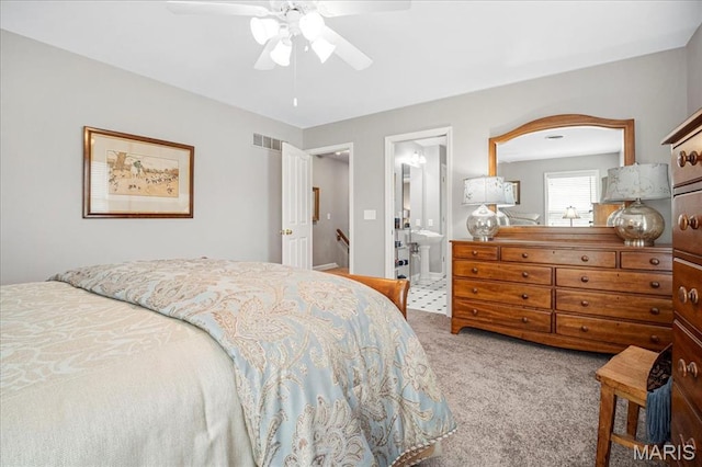 2175 Oberhelman Rd, Foristell, MO 63348 - carpeted bedroom with ceiling fan and ensuite bath