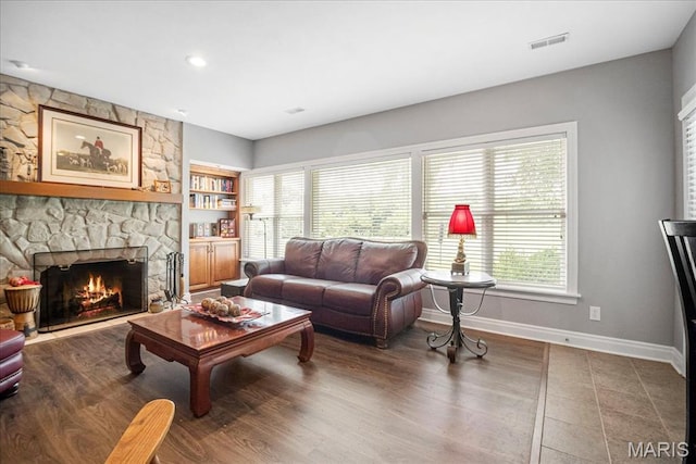 2175 Oberhelman Rd, Foristell, MO 63348 - living area featuring a fireplace and wood finished floors