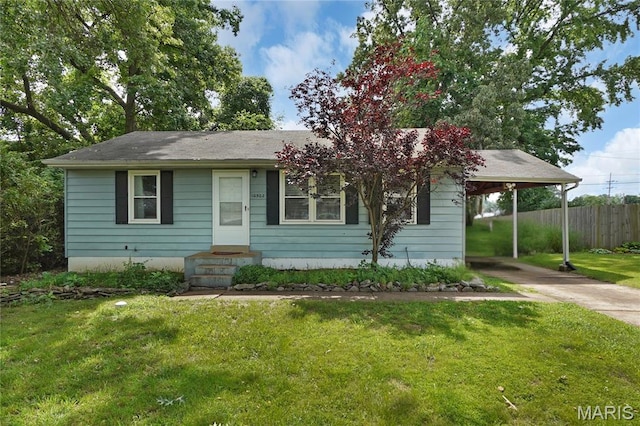 10502 Kamping Ln, Saint Louis, MO 63123 - view of front of house with concrete driveway, an attached carport, and entry steps