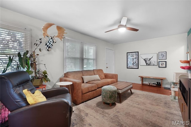 10502 Kamping Ln, Saint Louis, MO 63123 - living room with a ceiling fan and wood finished floors