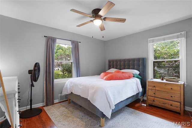10502 Kamping Ln, Saint Louis, MO 63123 - bedroom with wood finished floors and a ceiling fan