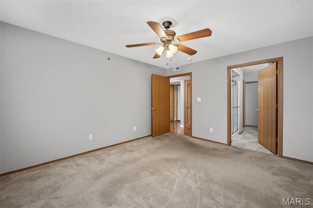 1141 Arbor Creek Dr Unit 2C, Saint Louis, MO 63122 - unfurnished bedroom with carpet floors, a ceiling fan, and a spacious closet