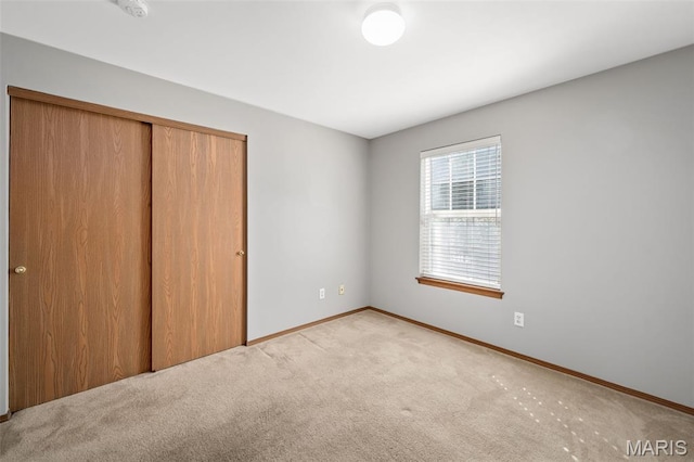 1141 Arbor Creek Dr Unit 2C, Saint Louis, MO 63122 - unfurnished bedroom featuring a closet and carpet flooring