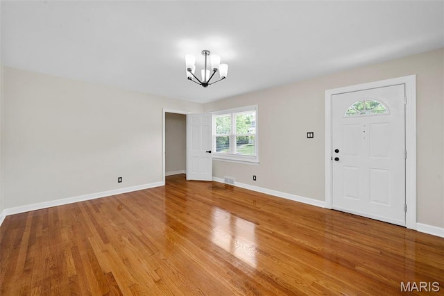841 N Geyer Rd, Kirkwood, MO 63122 - entryway featuring a chandelier and light wood finished floors