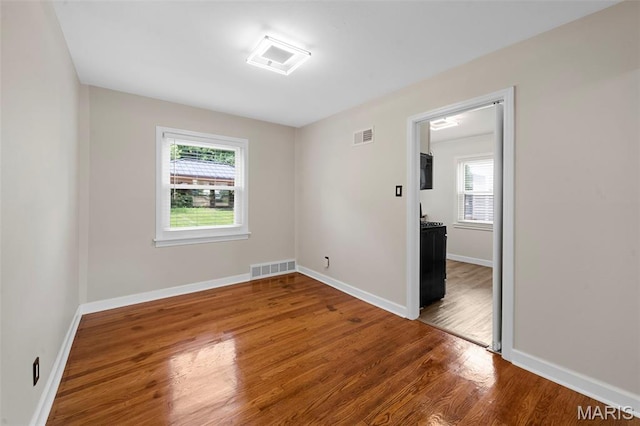841 N Geyer Rd, Kirkwood, MO 63122 - spare room featuring plenty of natural light and wood finished floors