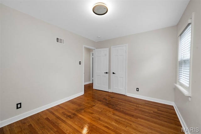 841 N Geyer Rd, Kirkwood, MO 63122 - unfurnished bedroom featuring wood finished floors and a closet