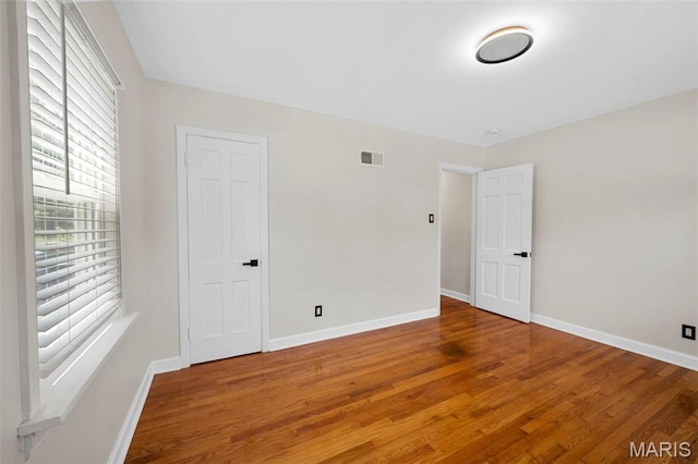 841 N Geyer Rd, Kirkwood, MO 63122 - unfurnished room featuring wood finished floors