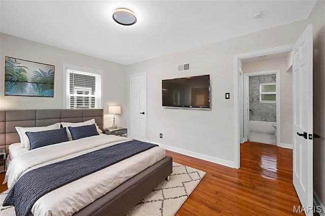841 N Geyer Rd, Kirkwood, MO 63122 - bedroom with baseboards and wood finished floors