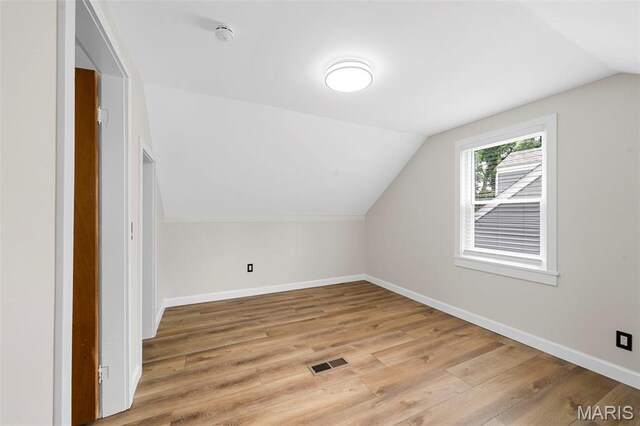 841 N Geyer Rd, Kirkwood, MO 63122 - additional living space with vaulted ceiling and light wood-style flooring