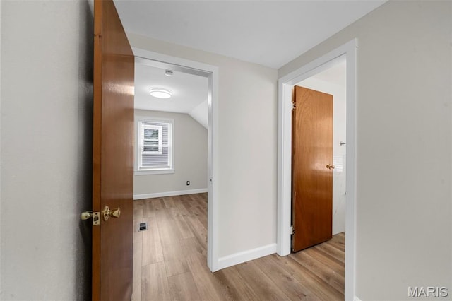 841 N Geyer Rd, Kirkwood, MO 63122 - hallway featuring wood finished floors and vaulted ceiling