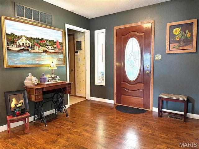 18 Sandstone Ct, Troy, IL 62294 - entryway with wood finished floors and a textured ceiling