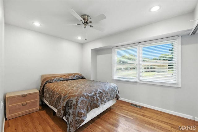 3205 Fleet Ln, Saint Charles, MO 63301 - bedroom featuring wood finished floors, recessed lighting, and a ceiling fan