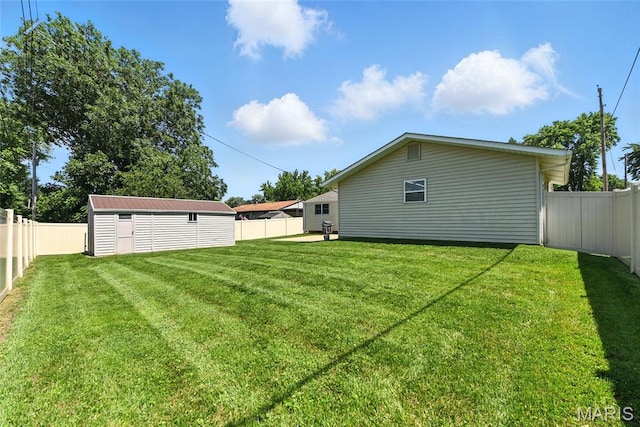 3205 Fleet Ln, Saint Charles, MO 63301 - back of property featuring a fenced backyard and an outdoor structure